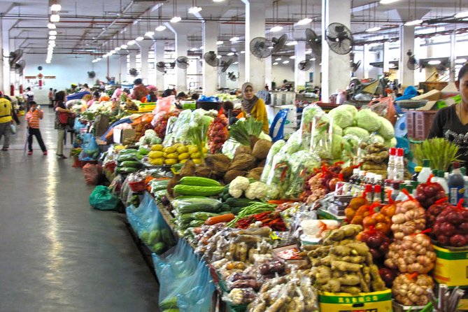 Day Trip Sepilok Orang-utan And City Tour (Flight Excluded) - Sandakan after lunch: a quick look at local life