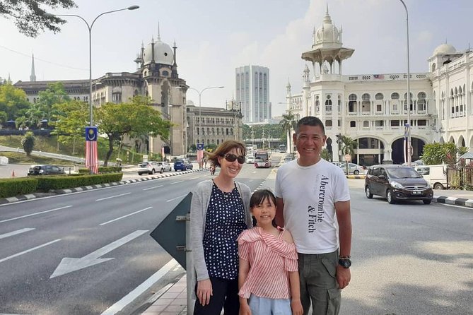 Explore Kuala Lumpur: Iconic City Landmarks & Batu Caves - Batu Caves and the gold Murugan statue