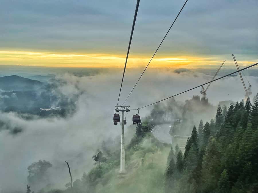 From Kuala Lumpur: Genting Highlands Day Trip with Cable Car - Leaving Kuala Lumpur for cooler mountain air