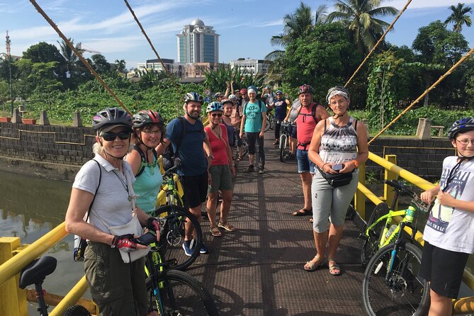 Half-Day Heritage Bike Tour in Kuching - Crossing the Sarawak River by traditional sampan