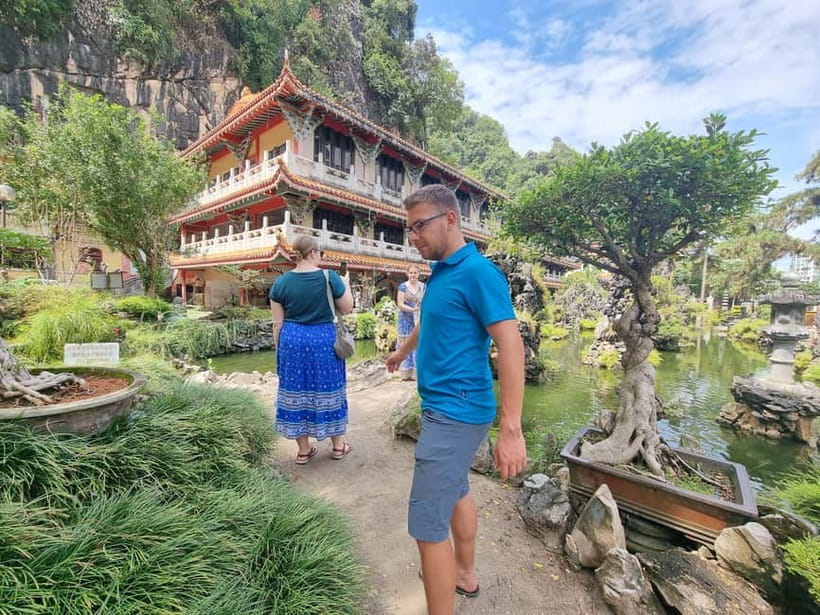 Ipoh Cave Temples Tours - Mirror Lake adds a calm finish