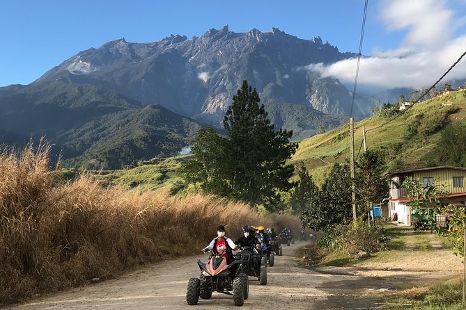 Kota Kinabalu ATV Riding and Dairy Farm at Mountain Kinabalu - Riding over hills, farmland, and village roads