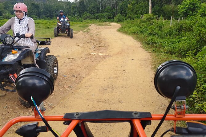 Langkawi Highlights Day Tour - ATV, Mangrove Cruise & Cable Car - A 1:30 p.m. stop for batik and local craft