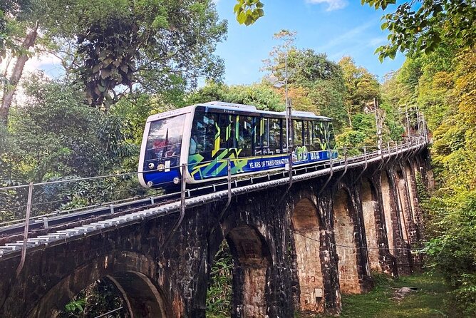 Penang Full Day Tour with Penang Hill, Kek Lok Si & Fruit Farm - Batu Ferringhi gives you a quick coastal start