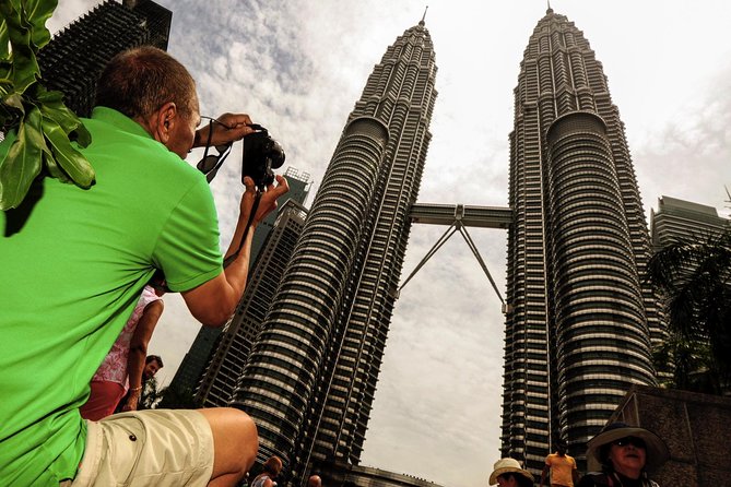 Private Kuala Lumpur City Tour With Petronas Tower & Local Dinner - A six-hour introduction to Kuala Lumpur after dark