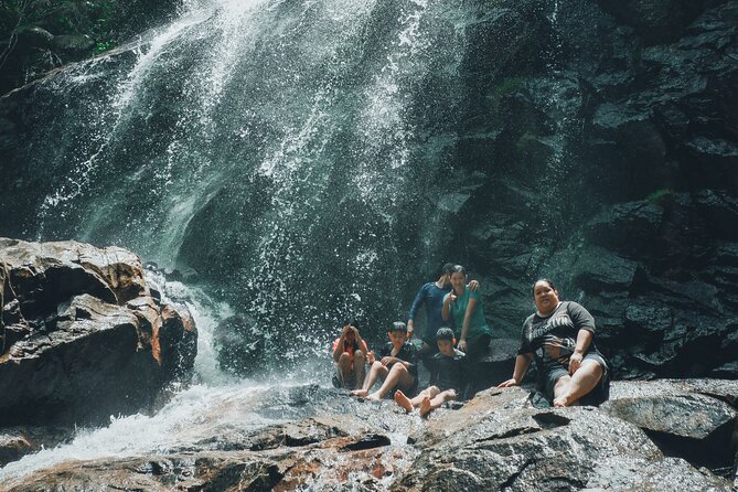 Secluded Waterfall Adventure - The lower waterfall: photographs, shallow water, and a rainbow