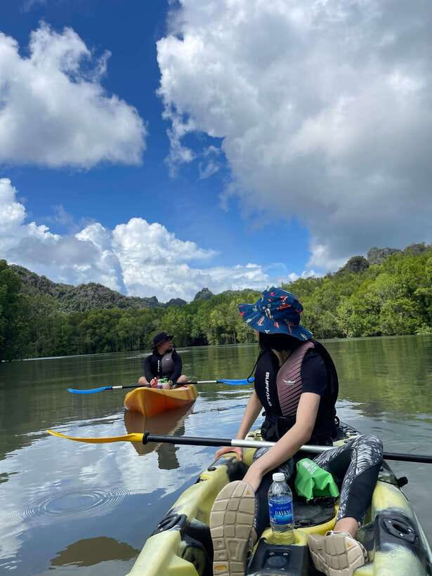 Small Group, Big Heart: Kilim Karst Mangrove Kayak Adventure - Paddling beneath limestone cliffs